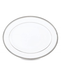 Metropolitan sensibility and modern design combine in this understated white bone china platter from Lenox's collection of dinnerware and dishes. Platinum gild along the edge is enhanced by a clean, platinum geometric pattern reminiscent of architectural accents. Metropolitan sensibility and modern design combine in this understated white bone china platter from Lenox's collection of dinnerware and dishes. Platinum gild along the edge is enhanced by a clean, platinum geometric pattern reminiscent of architectural accents.