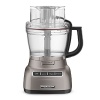 When cooking seems like too much of a process, along comes the powerful KitchenAid Architect food processor to make everything simple again. Its sleek, cocoa-silver finish looks great on any countertop, while a new 3-in-1, wide-mouth food pusher provides the right sized tool for every task. 1-year limited warranty. Model KFP1333.