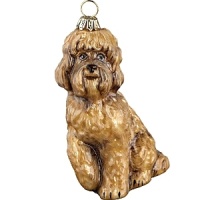 Mouth blown and hand painted by some of the finest artists in Poland, this Labradoodle ornament is a favorite for hanging on the tree. This collection has been taken to a whole new level in detail, uniqueness and artistic direction. Mouth blown and hand painted by some of the finest artists in Poland, this Labradoodle ornament is a favorite for hanging on the tree. This collection has been taken to a whole new level in detail, uniqueness and artistic direction.
