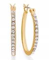 Hoops with an extra hint of glamour. Lauren by Ralph Lauren 3/4 hoop earrings are coated in glittering pave-set crystal. Crafted in gold tone mixed metal. Approximate diameter: 1/2 inch.