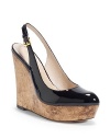 THE LOOKAlmond toePatent leather upperAdjustable slingback strapPadded insoleMetallic cork wedge, 5 (125mm)Metallic cork platform, 1 (25mm)Compares to a 4 heel (100mm)THE MATERIALPatent leather upperLeather lining and soleORIGINImported