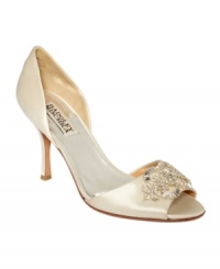 A pretty two-piece pump with a dressy sheen. Badgley Mischka's Salsa single-sole evening pumps feature sparkly accents on the toe. A pretty two-piece pump with a dressy sheen. Badgley Mischka's Salsa single-sole evening pumps feature sparkly accents on the toe.