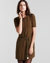 An front zip placket with an oversized pull lends lighthearted appeal to this timeless Burberry dress.