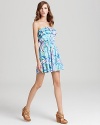 April showers bring May flowers, and this Lilly Pulitzer dress captures the essence of that natural beauty with a vivid floral print on an effortless strapless silhouette.