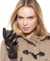 Stay warm, stay connected. These leather smarTouch gloves by Isotoner offer a smooth fit along with patent-pending fingertips that allow you to operate your touchscreen devices.