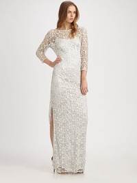 Shimmering metallic lace, in an evening-perfect floor-length silhouette.BoatneckThree-quarter sleevesSide slitV back with concealed zipFully linedAbout 43 from natural waist97% polyester/3% spandexDry cleanImportedModel shown is 5'9½ (177cm) wearing US size 4. Shimmering metallic lace, in an evening-perfect floor-length silhouette.BoatneckThree-quarter sleevesSide slitV back with concealed zipFully linedAbout 43 from natural waist97% polyester/3% spandexDry cleanImportedModel shown is 5'9½ (177cm) wearing US size 4.