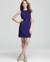 A belted waist lends a flattering fit on Anne Klein's jewel-tone dress.