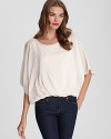 Exclusive to Bloomingdale's, this silk Alice + Olivia blouson top updates your wardrobe with easy elegance and polished versatility, pairing seamlessly with everything from off-duty denim to workweek trousers.
