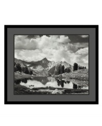 Time appears to stand still in this stunning print from renowned photographer Ansel Adams. Taken in 1925 in the Sierra Nevada mountains, the image pairs crystal-clear elements of earth, air and water for a gorgeous, truly ethereal result. Time appears to stand still in this stunning print from renowned photographer Ansel Adams. Taken in 1925 in the Sierra Nevada mountains, the image pairs crystal-clear elements of earth, air and water for a gorgeous, truly ethereal result.