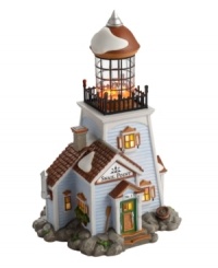 A New England must-have, the Snail Point Lighthouse is a waterfront essential. Set on a rocky landscape and dusted in a light covering of snow, this wintry retreat is an escape from the cold, emanating a seasonal warmth from bright windows and a glowing flame at top. A New England must-have, the Snail Point Lighthouse is a waterfront essential. Set on a rocky landscape and dusted in a light covering of snow, this wintry retreat is an escape from the cold, emanating a seasonal warmth from bright windows and a glowing flame at top.