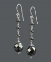 Disco-esque and totally dramatic. These glittering drop earrings feature faceted hematite beads (20-1/2 ct. t.w.) set in sterling silver. Approximate drop: 2 inches.