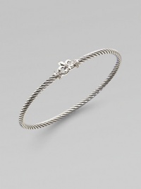 From the Cable Collection. An elegant piece with diamond accents on a sterling silver cable bangle. Sterling silverDiamonds, .08 tcwDiameter, about 2½Slip-on styleImported 