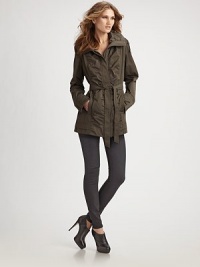 Packs into its own matching travel bag, this water and wrinkle-resistant style combines fashion, function and practicality.Funnel collar with hidden hood Concealed button front and cuffs Front ruching Welt pockets Attached belt About 30 from shoulder to hem Polyester Machine wash or dry clean Imported Packs into its own matching travel bag, this water and wrinkle-resistant style combines fashion, function and practicality.Funnel collar with hidden hood Concealed button front and cuffs Front ruching Welt pockets Attached belt About 30 from shoulder to hem Polyester Machine wash or dry clean Imported