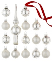 Find more than a few silver linings in Kurt Adler's mini Christmas ornaments. Glass with a matte or shiny finish is striped and spotted with metallic glitter, creating an altogether elegant tree. Find more than a few silver linings in Kurt Adler's mini Christmas ornaments. Glass with a matte or shiny finish is striped and spotted with metallic glitter, creating an altogether elegant tree.