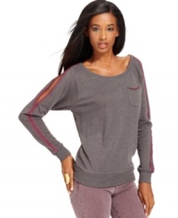 Contrast trim and sleeve cutouts add an edge to this GUESS top -- perfectly paired with your fave denim! Contrast trim and sleeve cutouts add an edge to this GUESS top -- perfectly paired with your fave denim!