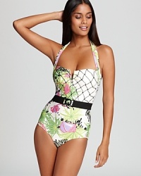 Channel a glamorous '50s vixen in the retro-inspired silhouette of this Nanette Lepore one piece. A belted waist and provocative neckline accent an hourglass figure. Channel a glamorous '50s vixen in the retro-inspired silhouette of this Nanette Lepore one piece. A belted waist and provocative neckline accent an hourglass figure.