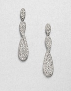EXCLUSIVELY AT SAKS. This sparkling piece features an elegant twisted design. CrystalsRhodium-plated brassDrop, about 1.87Surgical steel post backImported 