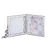 Take two photos of your loved-ones wherever you go. The hinged picture frame for two 2 3/4 x 2 7/8 photos and a mirror is small enough to go along with you. The clear crystal chatons and tassel accent of clear crystal beads add to the joy of reliving a memory.