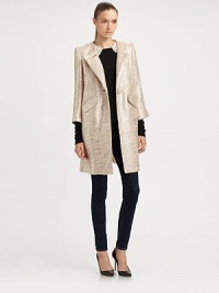 Timelessly tailored cocktail coat, shot through with lustrous metallic threads. JewelneckButton frontThree-quarter sleevesFront flap pocketsAbout 35 from shoulder to hemAcrylic/cotton/polyurethaneDry cleanMade in USA of imported fabricModel shown is 5'10 (177cm) wearing US size 4. Timelessly tailored cocktail coat, shot through with lustrous metallic threads. JewelneckButton frontThree-quarter sleevesFront flap pocketsAbout 35 from shoulder to hemAcrylic/cotton/polyurethaneDry cleanMade in USA of imported fabricModel shown is 5'10 (177cm) wearing US size 4.