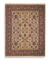 Patterned on an antique Mahal carpet design, this rug showcases the intricate beauty of flowers, leaves, vines, vases and palmettes on a soft ivory ground. A special dyeing process imparts rich, subtle gradations to a color palette that includes ivory, caramel, terra cotta, blues and soft greens. Woven in the USA of New Zealand premium worsted wool for indulgent softness.