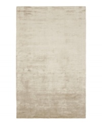 Presenting a solid, silvery hue in soft viscose, the Beckett area rug from Lauren Ralph Lauren offers a chic ground ripe for enhancing any modern setting. Durable enough to withstand heavy indoor traffic, yet luxuriously soft underfoot. Presenting a solid, silvery hue in soft viscose, the Beckett area rug from Lauren Ralph Lauren offers a chic ground ripe for enhancing any modern setting. Durable enough to withstand heavy indoor traffic, yet luxuriously soft underfoot.