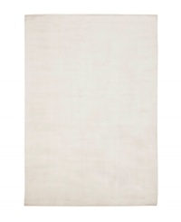 Presenting solid, classic white in soft viscose, the Beckett area rug from Lauren Ralph Lauren offers a chic ground ripe for enhancing any modern setting. Durable enough to withstand heavy indoor traffic, yet luxuriously soft underfoot. Presenting solid, classic white in soft viscose, the Beckett area rug from Lauren Ralph Lauren offers a chic ground ripe for enhancing any modern setting. Durable enough to withstand heavy indoor traffic, yet luxuriously soft underfoot.