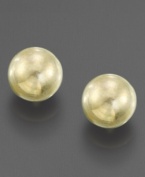 The perfect earrings for a little one: 14k gold balls make an adorable accessory.