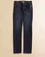 Jeans and leggings in one, in a medium wash with subtle front whiskering and classic 5-pocket jean details.Waistband with belt loops and button close Front zip fly Front pockets, including coin pocket, with rivet details Back patch pockets Whiskering across thighs Skinny fit Cotton/polyester/spandex; machine wash Made in USA