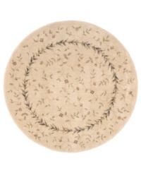 A beautiful lattice of delicate vines and blooming flowers gives this rug its magnetic charm. On a light beige ground with soft accents of red and blue, this densely woven piece invites you into wonderful interior decor. A beautiful lattice of delicate vines and blooming flowers gives this rug its magnetic charm. On a light beige ground with soft accents of red and blue, this densely woven piece invites you into wonderful interior decor.