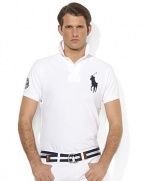 Cut for a trim, athletic fit from breathable cotton mesh, this iconic short-sleeved polo shirt is designed exclusively for Ralph Lauren's collection celebrating the Wimbledon Championships.