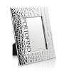 Featuring a wide crocodile-patterned border in gleaming plated silver, this unique frame from Argento gives favorite photos a fresh, modern look.