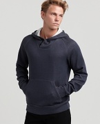 A retro favorite with contemporary details, Theory's weathered knit hoodie is an off-duty staple.