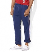 In celebration of the 2012 Olympic Games, a trim-fitting track pant is designed from soft, comfortable fleece with athletic-inspired detailing.