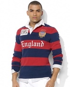 A traditional rugby shirt is cut for a trim, modern fit with athletic details and a bold flag patch, celebrating Team USA's participation in the 2012 Olympic Games.
