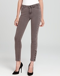 Make a military-inspired statement in these J Brand skinny jeans with button embellishments at the ankles for authentic appeal. Dress the look up with pumps or rock downtown cool with booties. Make a military-inspired statement in these J Brand skinny jeans with button embellishments at the ankles for authentic appeal. Dress the look up with pumps or rock downtown cool with booties.