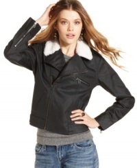 Levi's updates the classic Trucker jacket with a sherpa-trimmed collar and coated finish. The result? A denim layer that sports total edge. Levi's updates the classic Trucker jacket with a sherpa-trimmed collar and coated finish. The result? A denim layer that sports total edge.