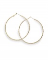 Go for the gold! Crafted in gold tone mixed metal, Alfani's classic hoop earrings get a design update with a stylish textured surface. Approximate diameter: 2-1/4 inches.