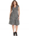 A swirling animal print puts a stylish spin on this plus size dress from Jones New York. (Clearance)