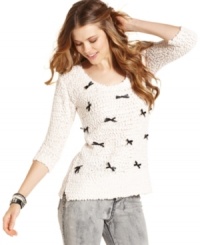 A nubby sweater sprinkled with bows, American Rag's three-quarter sleeve pullover is built for getting cozy in! A nubby sweater sprinkled with bows, American Rag's three-quarter sleeve pullover is built for getting cozy in!