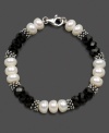 Take a classic cultured freshwater pearl bracelet (8-9 mm) to the dark side with the addition of faceted black onyx (8 mm). Bracelet crafted in sterling silver. Approximate length: 7-1/2 inches.