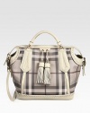 The iconic Burberry check defines this roomy shape of smooth PVC, finished with leather trim and super-chic tassels. Double leather top handles, 3¼ dropAdjustable detachable leather shoulder strap, 17-20½ dropTop zip closureOne inside zip pocketTwo inside open pocketsCotton lining13W X 12¾H X 7¾DMade in Italy