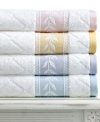 Crafted with pristine Martha Stewart Collection style, this Trousseau washcloth features a fresh white-on-white diamond pattern with embroidered leaf trim for a truly elegant appeal. Finished in pure cotton. (Clearance)