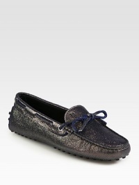 Contrasting laces enliven this timeless favorite of metallic pebble-grain leather. Pebbled metallic leather upperLeather liningRubber solePadded insoleMade in ItalyOUR FIT MODEL RECOMMENDS ordering one half size down as this style runs large. Contrasting laces enliven this timeless favorite of metallic pebble-grain leather. Pebbled metallic leather upperLeather liningRubber solePadded insoleMade in ItalyOUR FIT MODEL RECOMMENDS ordering one half size down as this style runs large.