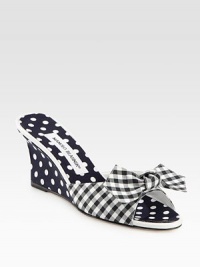 Vivid polka dots add charm to this mule wedge mixed with a classic gingham print and fine leather trim. Self-covered wedge, 3 (75mm)Fabric and grosgrain ribbon upper with leather trimGrosgrain liningLeather solePadded insoleMade in Italy Vivid polka dots add charm to this mule wedge mixed with a classic gingham print and fine leather trim. Self-covered wedge, 3 (75mm)Fabric and grosgrain ribbon upper with leather trimGrosgrain liningLeather solePadded insoleMade in Italy