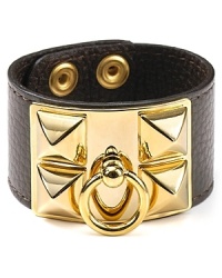 Think of this studded pyramid bangle as your classic-with-an-edge statement piece - so right now with this season's equestrian inspired pieces. Think of this studded pyramid bangle as your classic-with-an-edge statement piece - so right now with this season's equestrian inspired pieces.