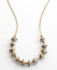 Old news is good news. Heart of Haiti artisans create this one-of-a-kind necklace from recycled newspaper, hand-rolling tiny strips into beads that are then sealed with clear polish and strung together to make a bold statement. Old news is good news. Heart of Haiti artisans create this one-of-a-kind necklace from recycled newspaper, hand-rolling tiny strips into beads that are then sealed with clear polish and strung together to make a bold statement.