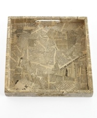 Newsflash: shredded bits of French newspaper make every Heart of Haiti tray truly one of a kind, but each tell the story of Haiti's dedicated artisans. Use for serving drinks, organizing cosmetics or corralling magazines. Newsflash: shredded bits of French newspaper make every Heart of Haiti tray truly one of a kind, but each tell the story of Haiti's dedicated artisans. Use for serving drinks, organizing cosmetics or corralling magazines.