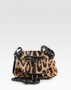 This petite wonder is constructed with leopard print hair calf and has luxurious leather trim.Adjustable shoulder strap, 19-24 dropSnap flap closureOne outside zip pocket on flapThree outside open pocketsThree inside credit card slotsCotton lining6¾W X 6H X 3DImported