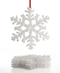 Looks like snow. Elegant snowflakes offer a touch of luminous charm to your tree in this set of 6 Holiday Lane ornaments. Looks like snow. Elegant snowflakes offer a touch of luminous charm to your tree in this set of 6 Holiday Lane ornaments.