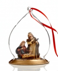Covered by a clear, opulent glass dome, Mary and Joseph adore their newborn son in this ornament to be treasured for years to come. Covered by a clear, opulent glass dome, Mary and Joseph adore their newborn son in this ornament to be treasured for years to come.